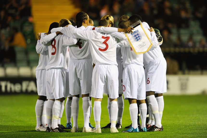 The England U16 team huddle together ahead of the Victory Shield encounter against Wales in October 2009.